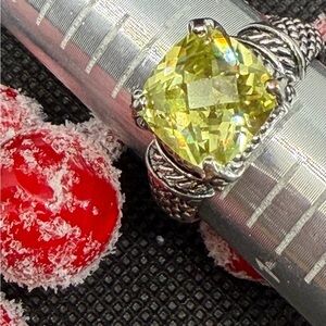 Elegant Silver and Yellow Gemstone Ring
